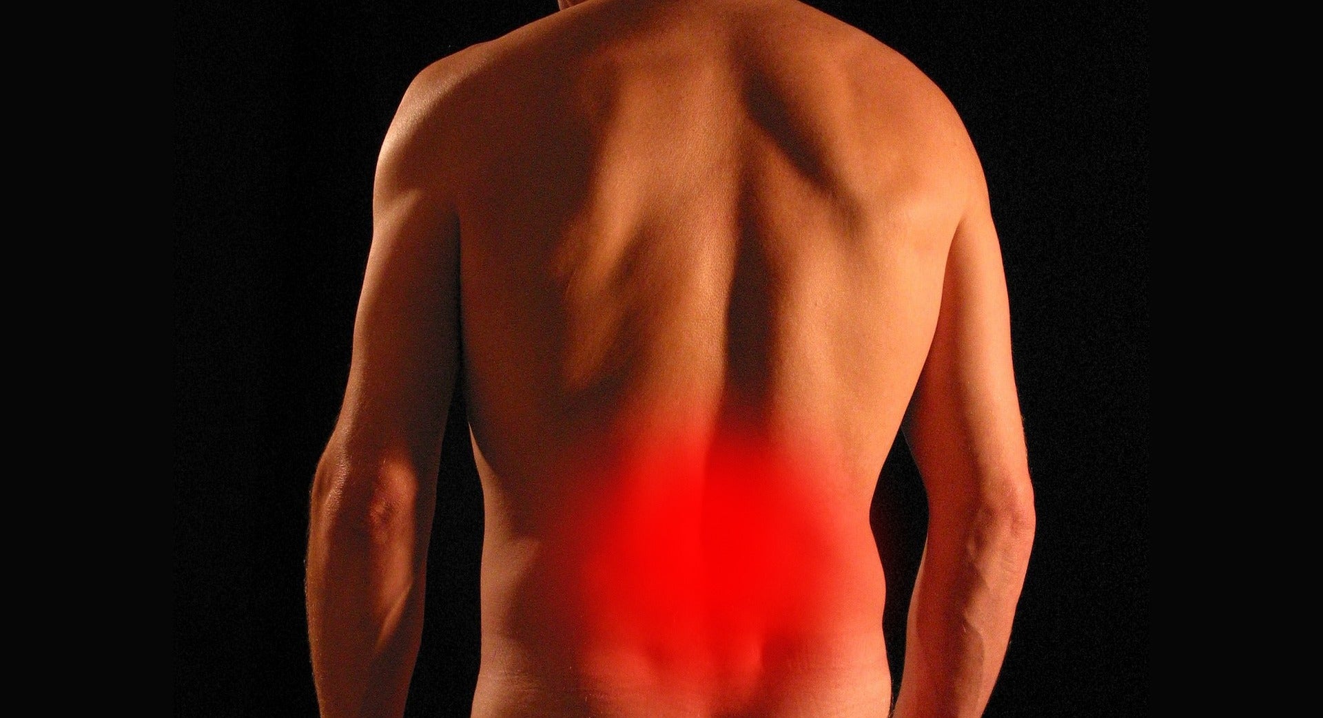 An image showing back pain. Image by Tumisu from Pixabay.