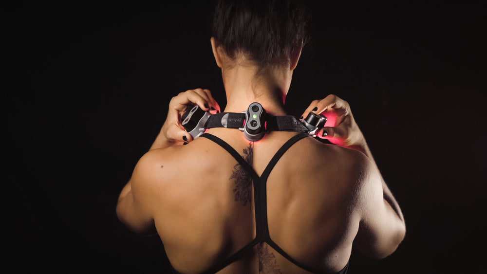 An image of a female neck using light therapy.