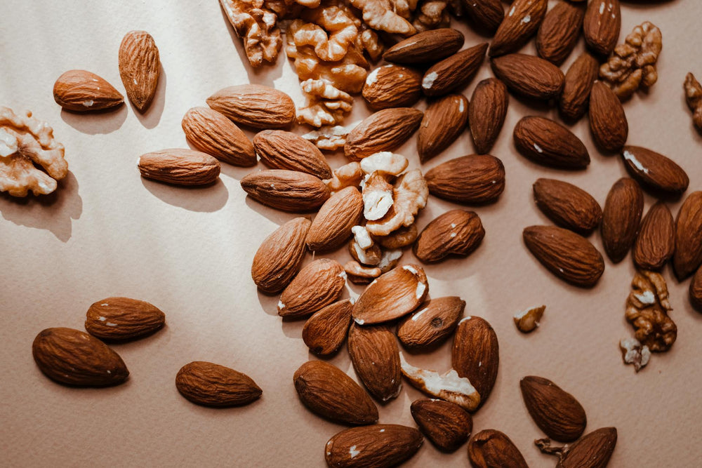 An image of almond nuts taken in a studio.