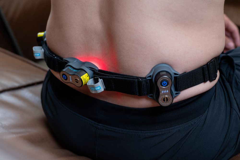 Image of Kineon red light therapy device used for back pain.