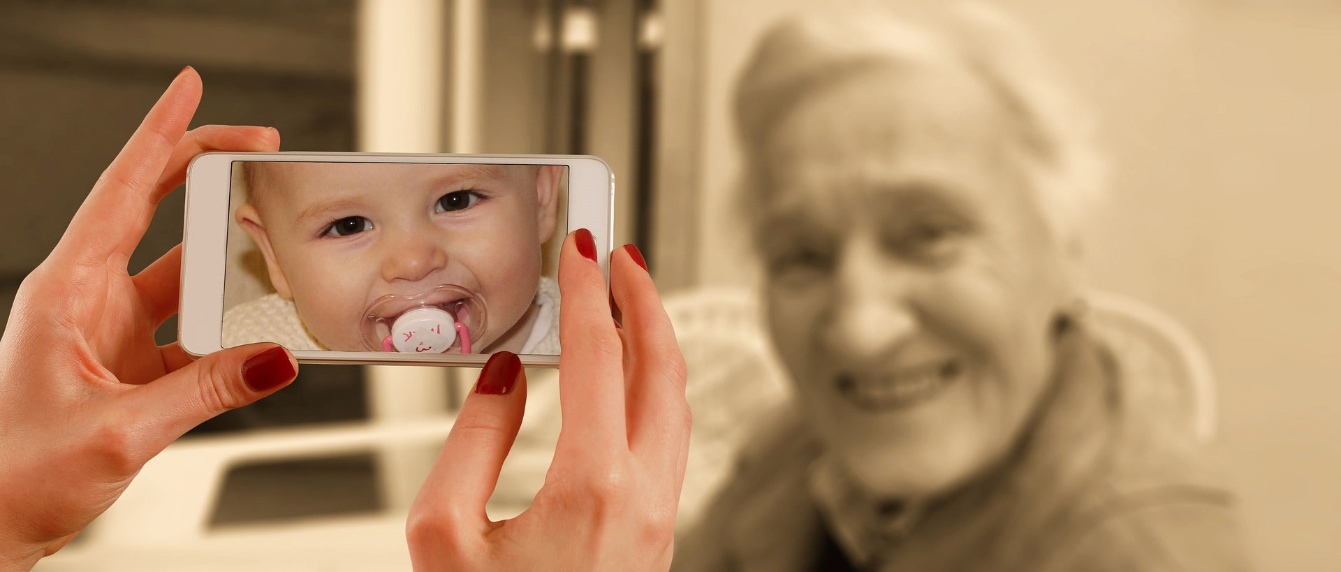 An image of a baby and a blurred image of an old woman.