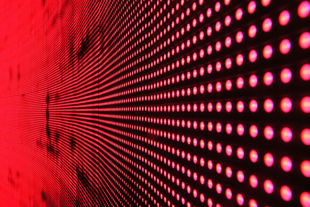 Red dot lights signifying led laser light therapy.