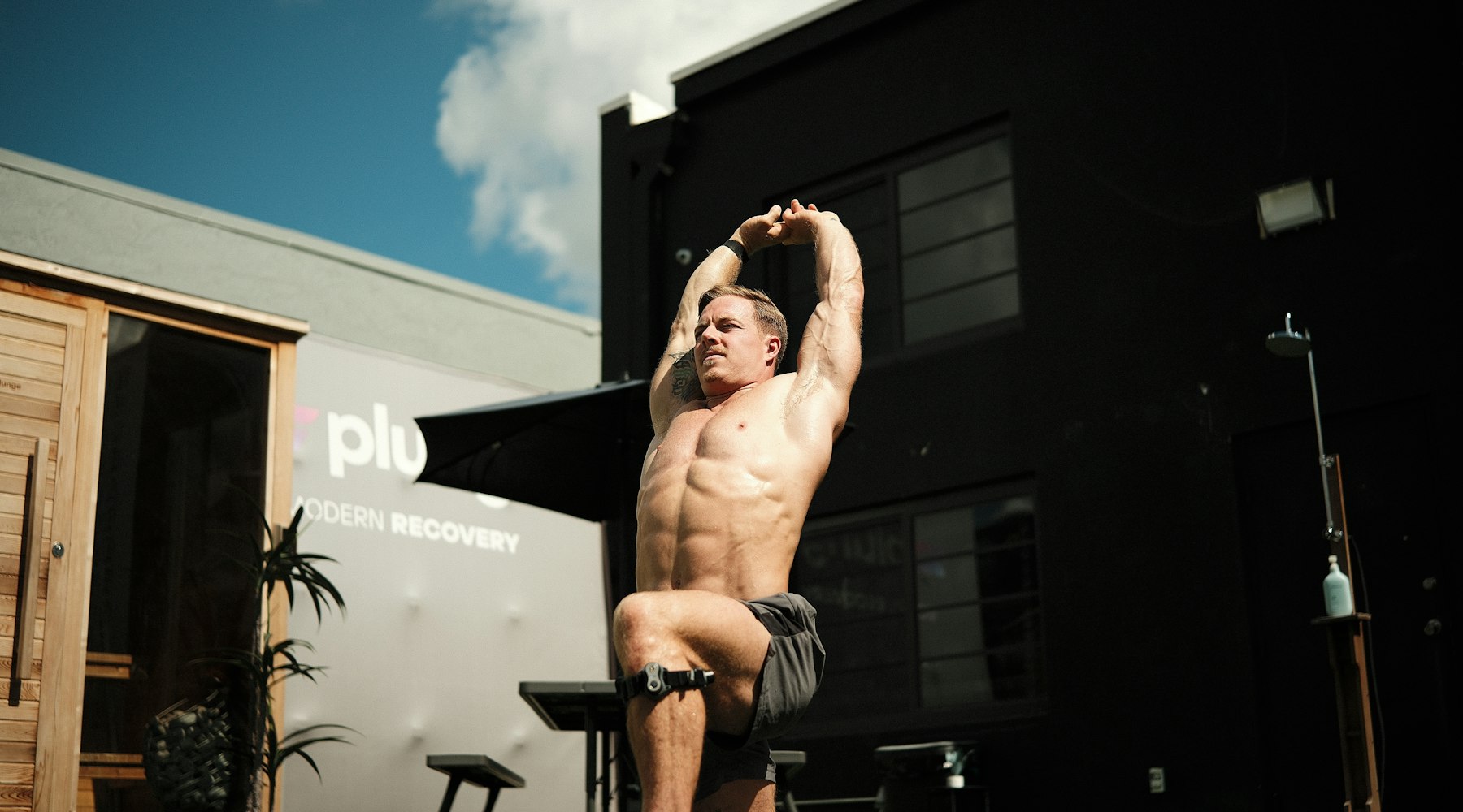 A man stretching or doing yoga to take control of his life and his overall wellbeing.