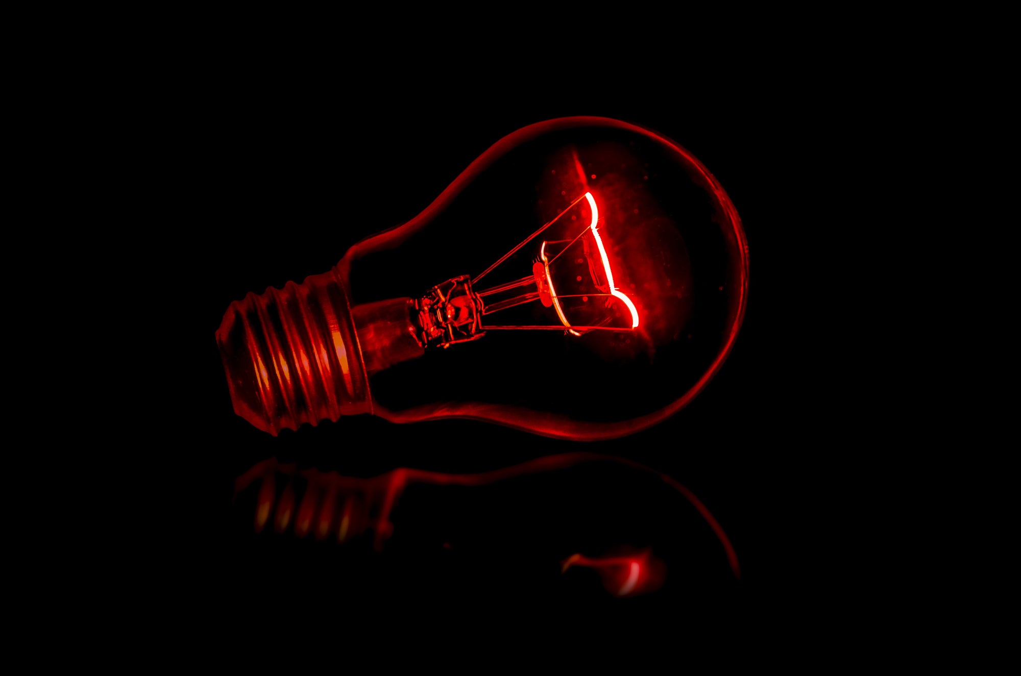 An image of a bulb emiting red light.