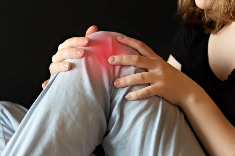 A woman struggling with arthritis os joint pain in the knee.